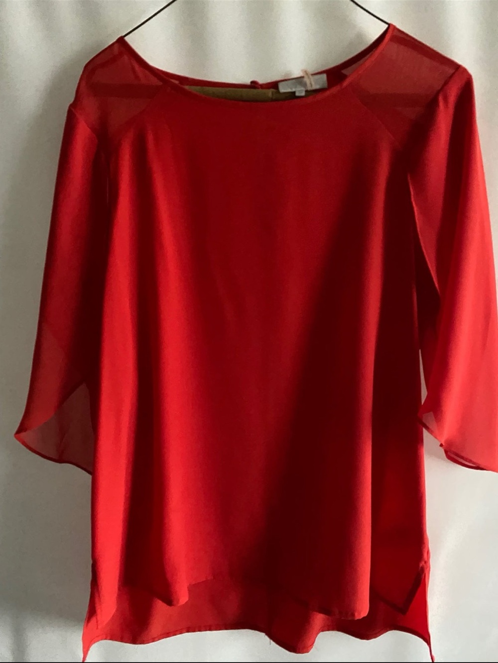 LN 1. State red/orange blouse with sheer flutter sleeves